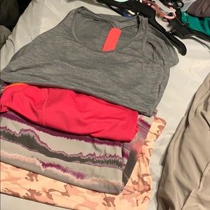 Lot of 4 sleeveless athletic tanks size large